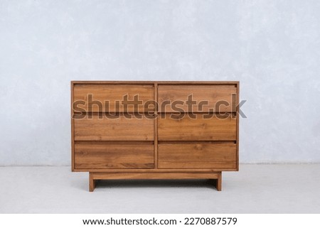 large nightstand with six drawers made of teak wood for home decoration Royalty-Free Stock Photo #2270887579