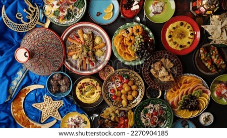 Ramadan halal food. Eid table setting top view. Hummus, Moroccan traditional cuisine. Authentic local homemade traditional meals Royalty-Free Stock Photo #2270904185