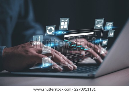 man analyst working with laptop in Business Analytics and Data Management System to make report with KPI and metrics connected to database. Corporate strategy for finance, operations, sales, marketing Royalty-Free Stock Photo #2270911131