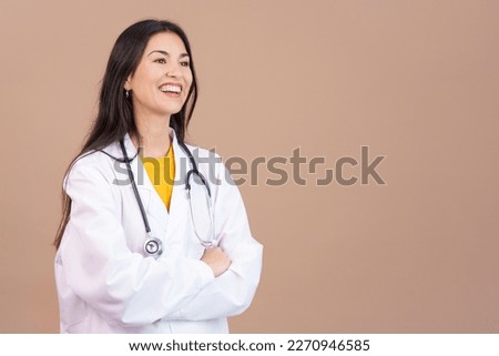 Friendly caucasian female doctor in uniform and stethoscope