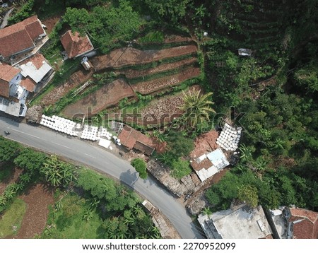 Countryside route with drone photo village houses.
