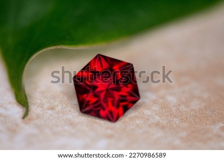 Natural Red Gemstone Garnet. Pyrope Garnet Natural Gemstone. Faceted Gemstone. Handmade faceted gemstone. Red Garnet from Tanzania.  Royalty-Free Stock Photo #2270986589