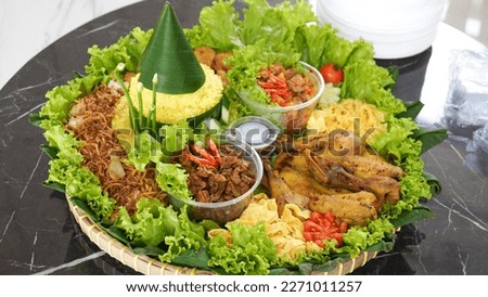 Tumpeng Nasi kuning for a celebration or thanksgiving event