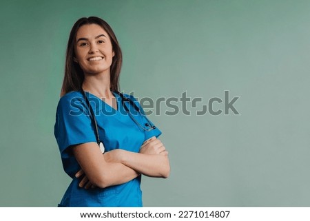 Portrait of young nurse with stethoscope, studio shoot. Royalty-Free Stock Photo #2271014807