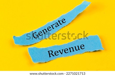 GENERATE REVENUE text on blue pieces of paper on yellow background, business concept