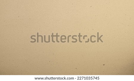 Abstract brown recycled craft paper texture.
Old Kraft beige paper box pattern background.
top view.