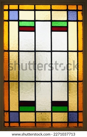 stained glass window in wood frame Royalty-Free Stock Photo #2271037713