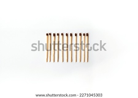 Wooden match or matchstick on white background. Royalty-Free Stock Photo #2271045303
