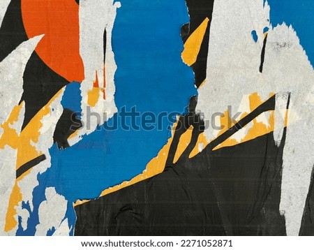 Colourful tattered torn yanked urban street poster placard texture  Royalty-Free Stock Photo #2271052871