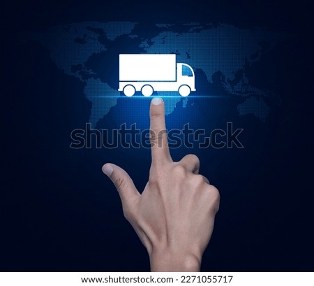 Hand pressing truck flat icon over digital world map technology style, Truck transportation service concept, Elements of this image furnished by NASA