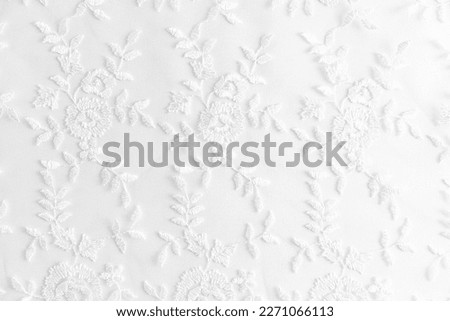 white lace background with small colors. Floral wedding lace fabric. layout of a wedding postcard Royalty-Free Stock Photo #2271066113