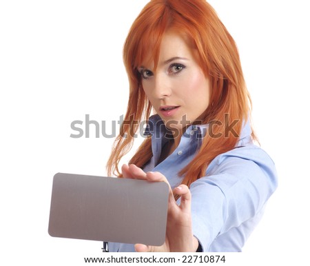 Beautiful redhead woman with notecard.