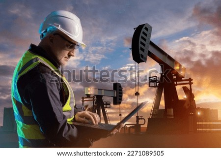 Oilman man. Fuel industry. Guy near oil pumps. Oilman with laptop. Energy resources deposit. Mining. Oilman career. Petroleum prey and processing. Man engineer. Career of fuel industry