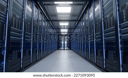 Inside Large Data Center. Advanced Cloud Computing Concept. Corridor with Server Racks and Cabinets full of Hard Drives Royalty-Free Stock Photo #2271093095