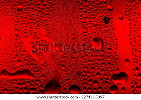 Ice cold glass fresh coca cola covered with water drops condensation Cold drink Drops of water cola drink background Raindrops texture Close up Royalty-Free Stock Photo #2271103097