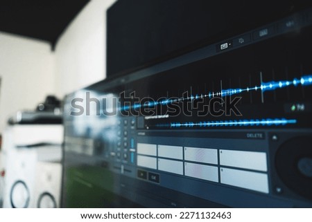 closeup shot of a sound and audio mixer and synthesizer device screen, home studio concept. High quality photo
