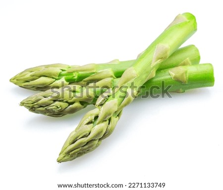 Fresh green asparagus isolated on white background. Royalty-Free Stock Photo #2271133749