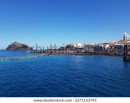 The photo shows the ocean near a former slaughterhouse on the island of Tenerife.