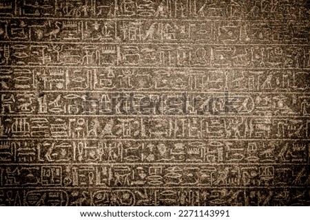 Ancient Egyptian hieroglyphics. Vintage background Royalty-Free Stock Photo #2271143991