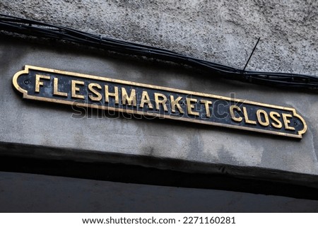 A sign above the entrance to Fleshmarket Close - one of the many wynds in the city of Edinburgh, Scotland.