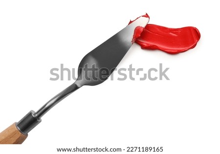 Red oil paint stroke made with palette knife on white background, top view Royalty-Free Stock Photo #2271189165