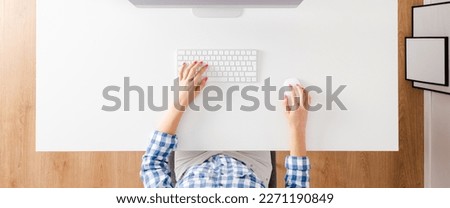 Woman working on computer. Office desktop