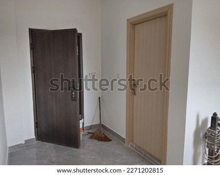 The plastic door is installed for the bathroom and the bedroom for sample installation.