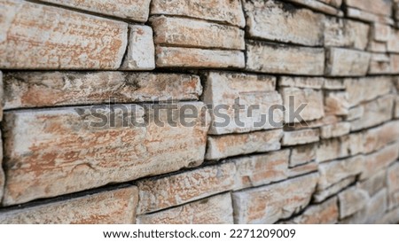 beautiful stone wall, fragment of colored stones, natural stone, beautiful background