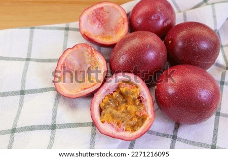 Heap of Fresh Ripe Passion Fruits on Checkers Kitchen Towel