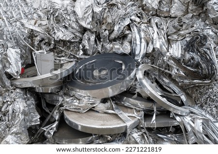 A pile of aluminum foil sorted for recycling closeup
