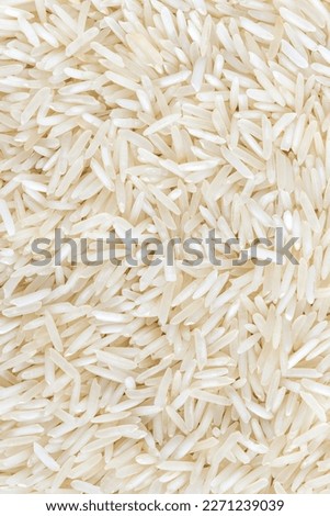 Basmati long white rice background, full frame Royalty-Free Stock Photo #2271239039