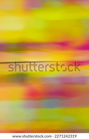 Multicolored sticky paper notes, motion blur effect, soft focus