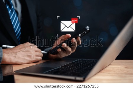 Businessman reading new email by laptop computer to customer, business contact and communication, email icon, email marketing concept, send e-mail or newsletter, online working internet network.