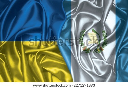 Ukraine and Guatemala folded silk flag together