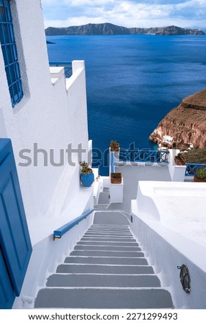 Traditional greek famous white architecture on Oia, Santorini island, Greece.	 Royalty-Free Stock Photo #2271299493