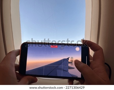 take a picture of an airplane wing with phone