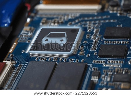 Chips in automotive manufacturing. Electronic circuit boards with chips. Smart car micro chip concept background.     Royalty-Free Stock Photo #2271323553
