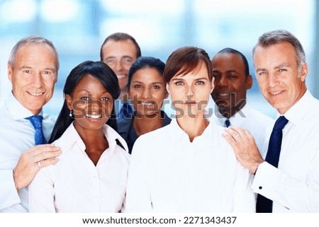 Multi ethnic business people posing for a photograph. Group of multi ethnic business people posing for a photograph. Royalty-Free Stock Photo #2271343437