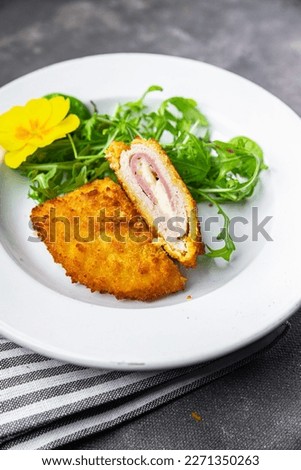 cordon bleu cutlet chicken meat, cheese, bacon second course meal snack on the table copy space food background rustic top view Royalty-Free Stock Photo #2271350263