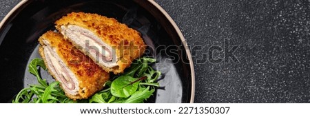 cordon bleu cutlet chicken meat, cheese, bacon second course meal snack on the table copy space food background rustic top view Royalty-Free Stock Photo #2271350307