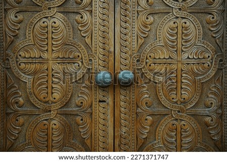 traditional Georgian door closeup
shot Royalty-Free Stock Photo #2271371747