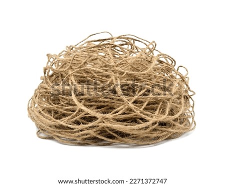 Tangled jute rope, isolated on white background Royalty-Free Stock Photo #2271372747