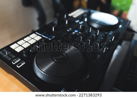 closeup shot of a black modern electronic sound device, music and home studio concept. High quality photo