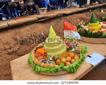 Tumpeng Nasi kuning is a typical Indonesian menu for the commemoration of Independence Day
