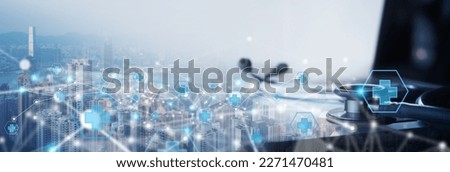 Telemedicine, internet medical network connection, online medical, global health concept. Stethoscope and laptop computer on the city background with internet health network connection technology Royalty-Free Stock Photo #2271470481