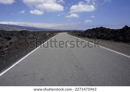 Asfalt road going throw lava field in Volcanoes National park in Big island in Hawaii