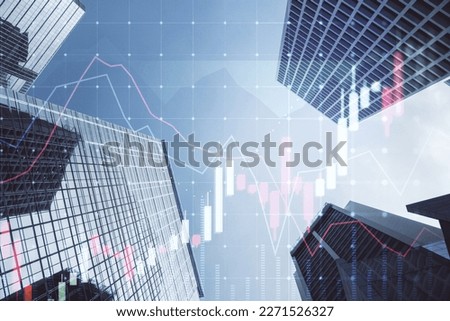 Real estate development and investing concept with digital growing financial chart candlestick on modern skyscraper tops bottom view background, double exposure