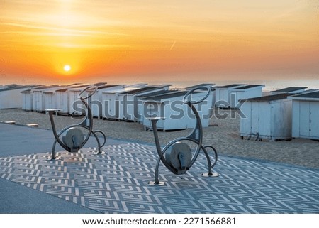 Beach and bike cabins on Calais beach, France