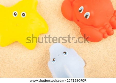image of rubber toy sand background 