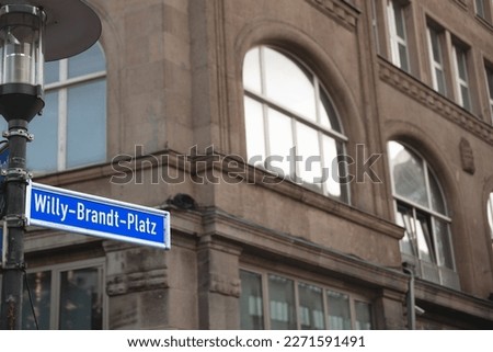 Selective blur on a street sign indicating heinrich Willy Brandt Platz square, one of the main squares of Essen city center dedicated to willy brandt, former social democrat chancellor of germany.